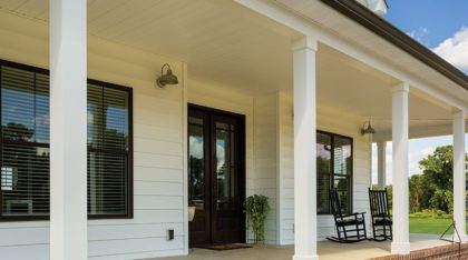 Attractive white insulated siding on a front porch