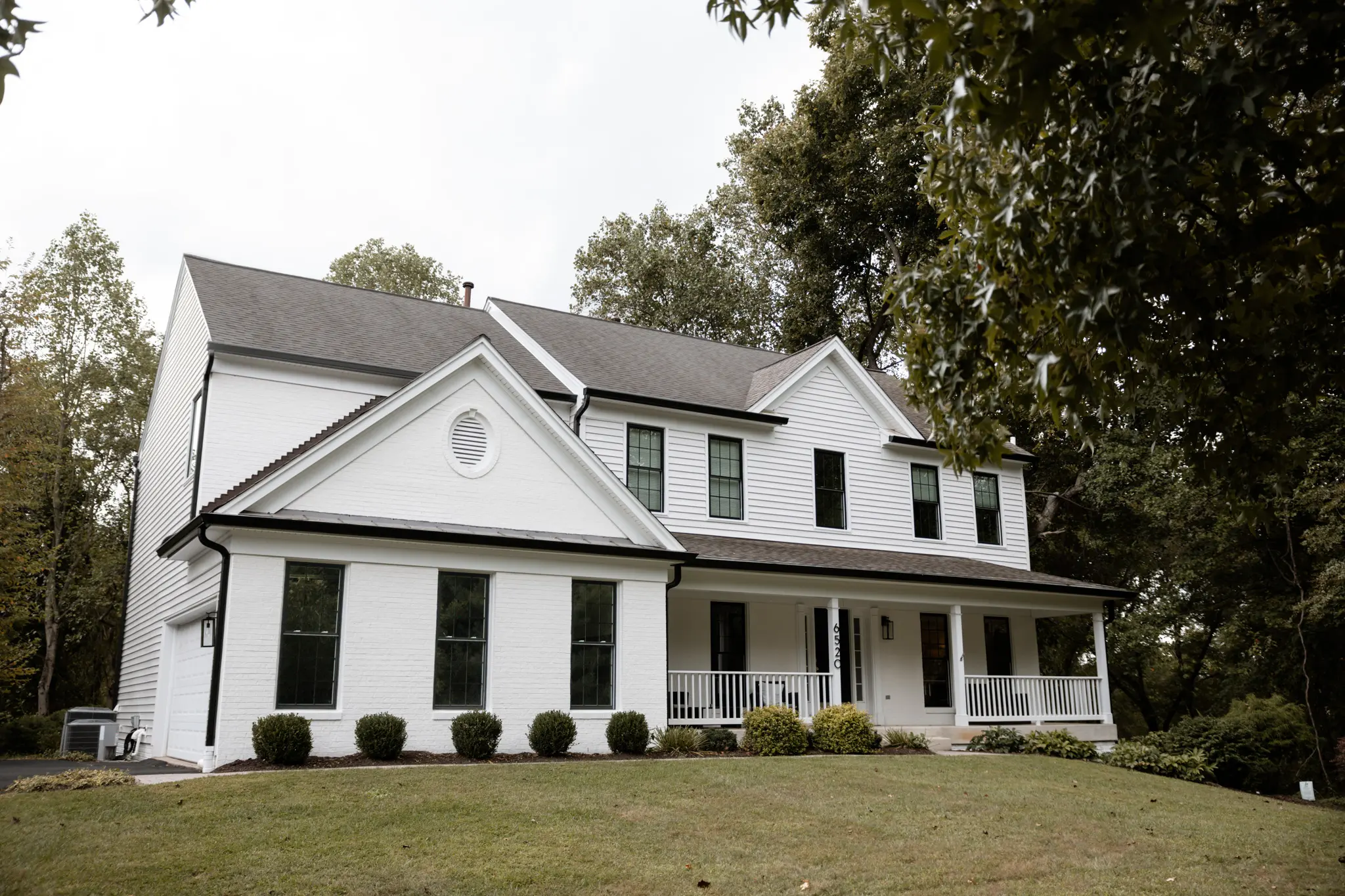 Clarksville home with white siding installed