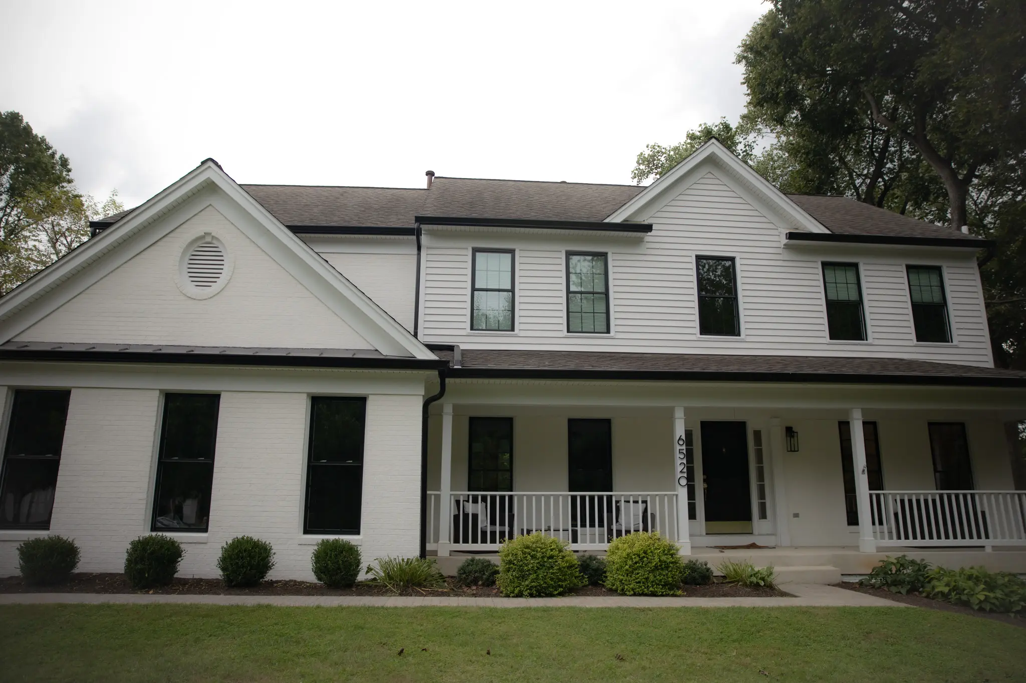 Clarksville home with white siding installed