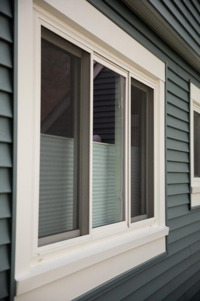 Reston home with blue vinyl installed by Presidential Exteriors