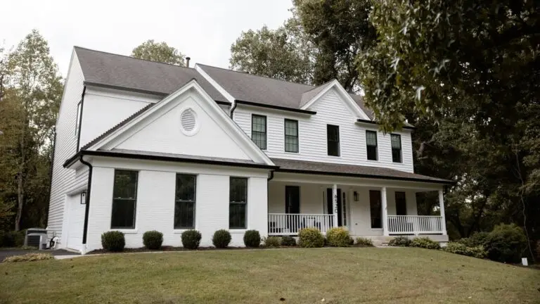 Clarksville home with white siding installed