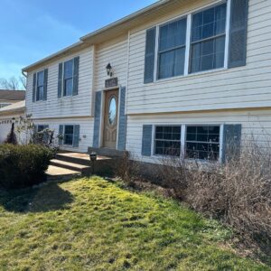 Before New deck, siding, and home addition installed on Fairfax home