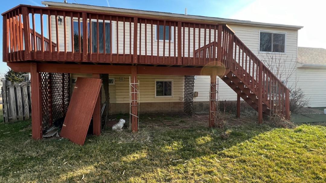 Before New deck, siding, and home addition installed on Fairfax home