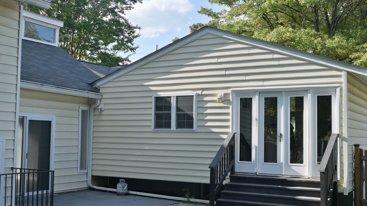 before vienna home upgraded with roofing replacement, siding and windows