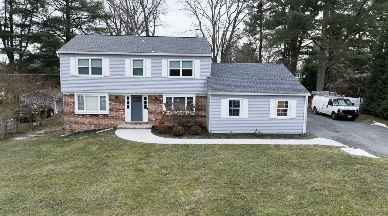 before ellicott city home remodel hardie siding replacement